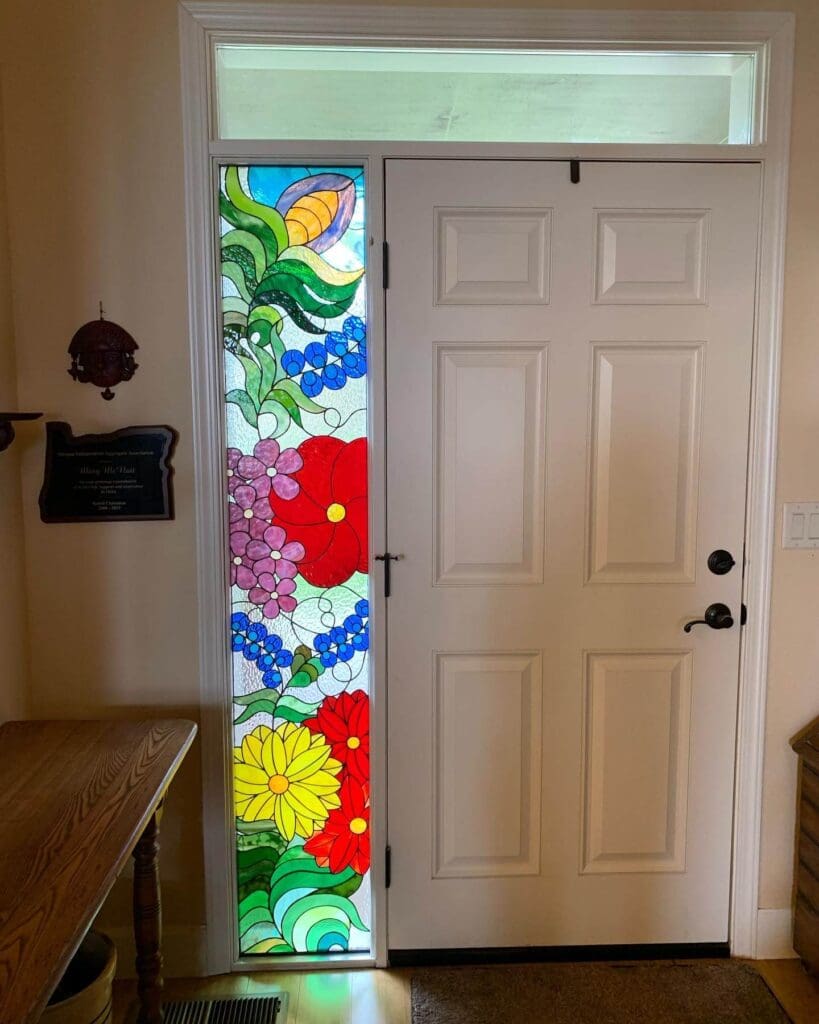 stained glass panel next to front door